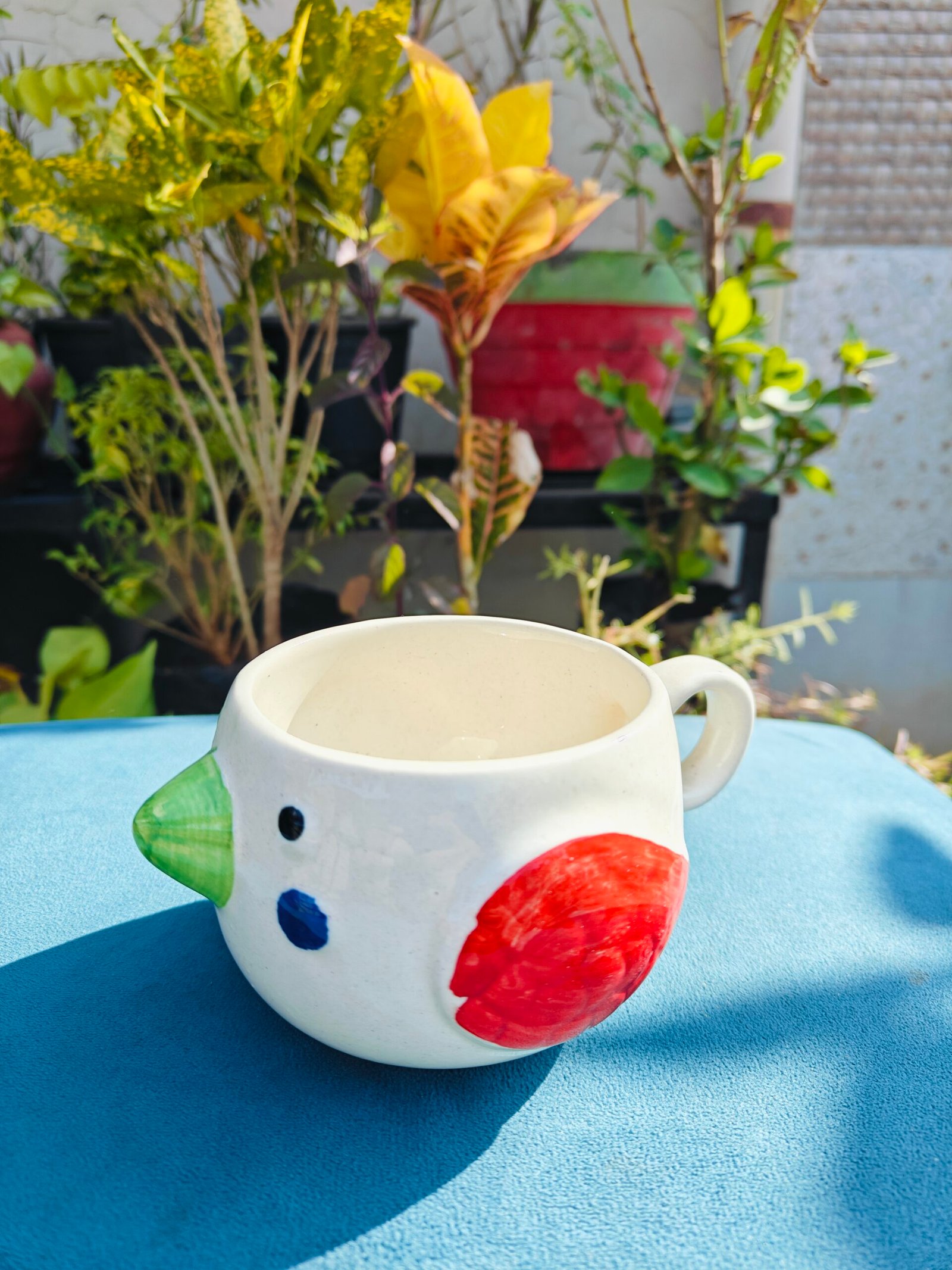 Bird Design Ceramic Cup and Saucer in Red